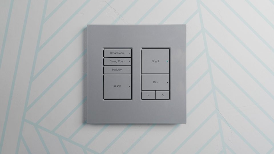 Metal light switch panel with labeled buttons and a USB socket.
